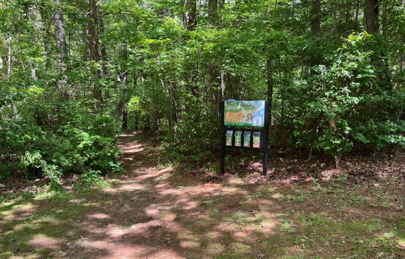 Trailhead Sign at edge of the woods