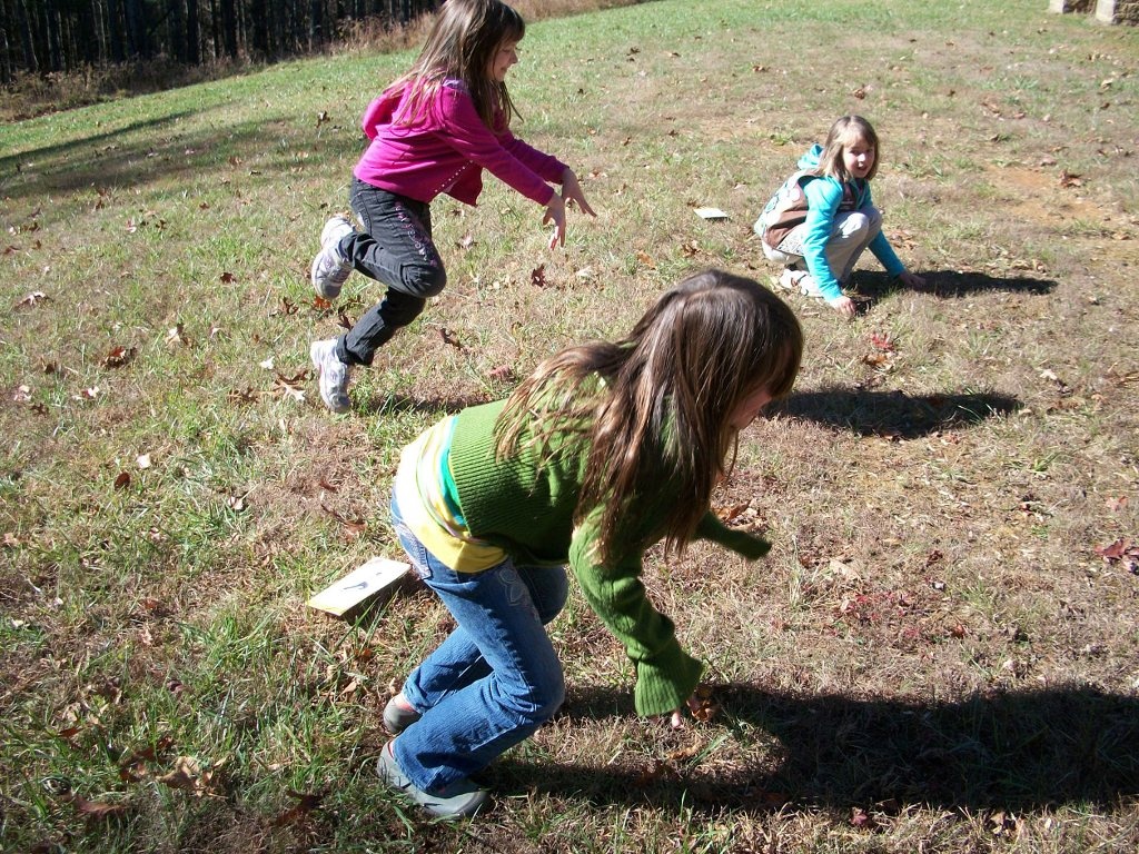 A group of girls act out a TRACKtivity